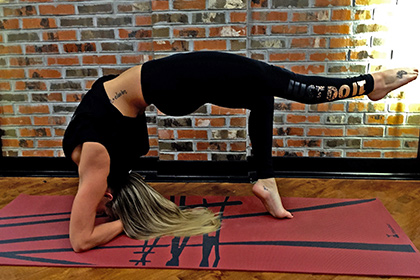 Woman in Headstand Variation Pose