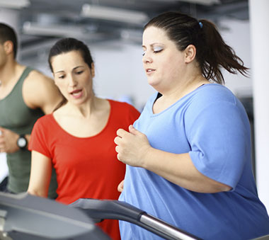 woman on treadmills