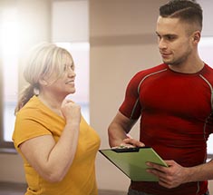 woman with personal trainer
