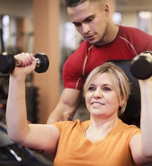woman with personal trainer