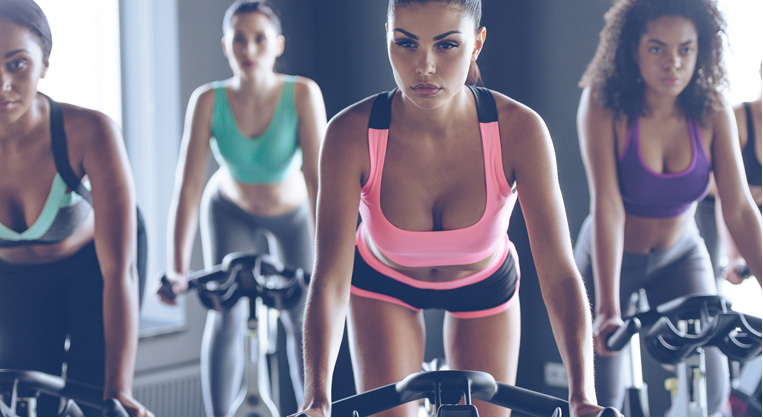 Women in a cycling fitness class