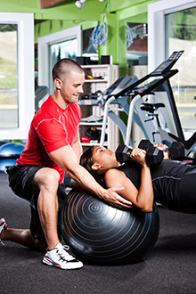 woman working out with a personal trainer